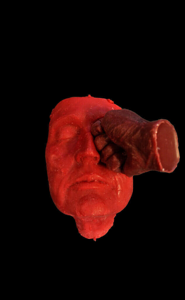 Ingrid Slaa l beeld - was- gezicht en vuist - titel zelf l sculpture - wax- face and fist - title self